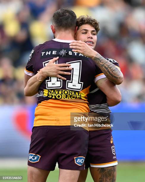 Kurt Capewell and Reece Walsh of the Broncos celebrate after winning the round 23 NRL match between North Queensland Cowboys and Brisbane Broncos at...