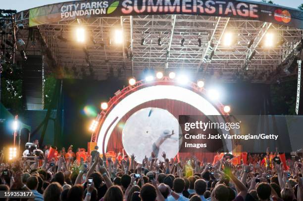 American rock musician Wayne Coyne, of the band the Flaming Lips, performs from inside a bubble at a Benefit on Central Park's SummerStage, New York,...