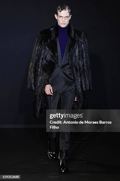 Model walks the runway during the Les Hommes show as a part of Milan Fashion Week Menswear Autumn/Winter 2013 on January 12, 2013 in Milan, Italy.