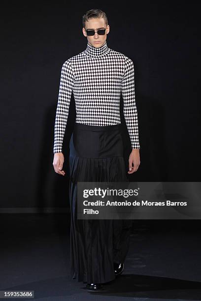 Model walks the runway during the Les Hommes show as a part of Milan Fashion Week Menswear Autumn/Winter 2013 on January 12, 2013 in Milan, Italy.