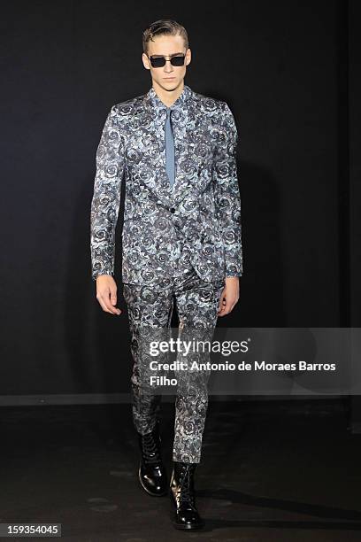 Model walks the runway during the Les Hommes show as a part of Milan Fashion Week Menswear Autumn/Winter 2013 on January 12, 2013 in Milan, Italy.