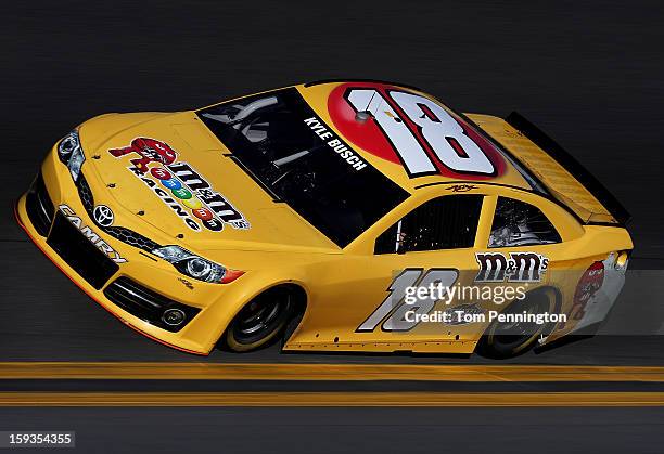 Kyle Busch drives the Toyota during the NASCAR Sprint Cup Preseason Thunder testing at Daytona International Speedway on January 12, 2013 in Daytona...