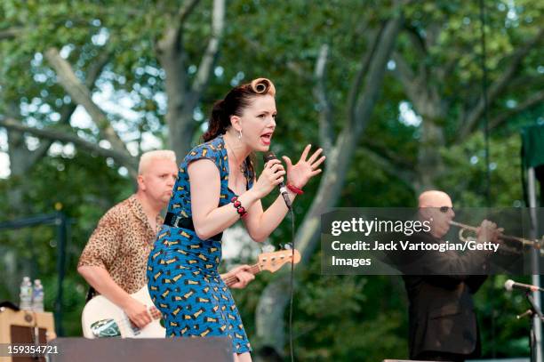 Irish musician Imelda May and her band, which includes Alan Gare on bass guitar and Dave Priseman on trumpet, perform on Central Park's SummerStage,...