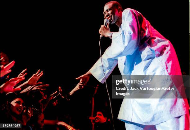 Senegalese musician Youssou N'Dour performs at his annual 'Great African Ball' concert at Hammerstein Ballroom, New York, New York, November 19, 2000.