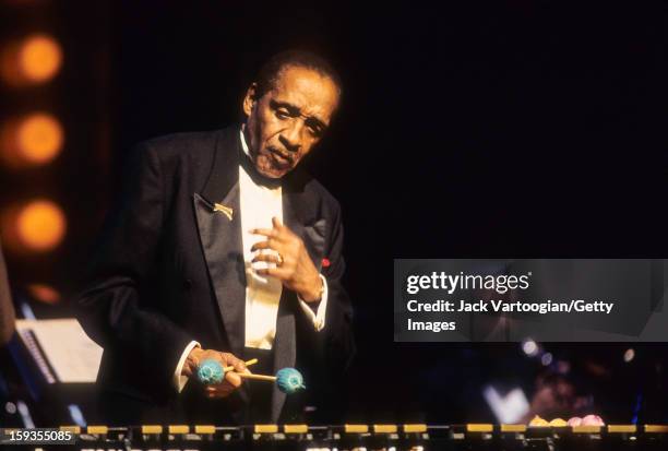 American jazz musician Milt Jackson plays vibraphone during performance at Harlem's Apollo Theater, New York, New York, March 19, 1996. The...