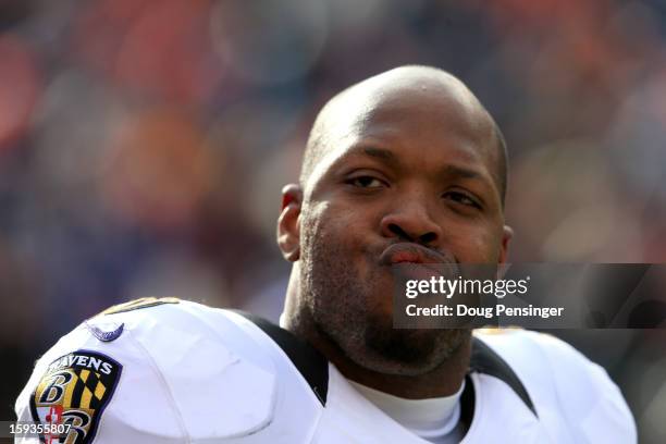 Terrell Suggs of the Baltimore Ravens looks on during warm ups against the Denver Broncos during the AFC Divisional Playoff Game at Sports Authority...