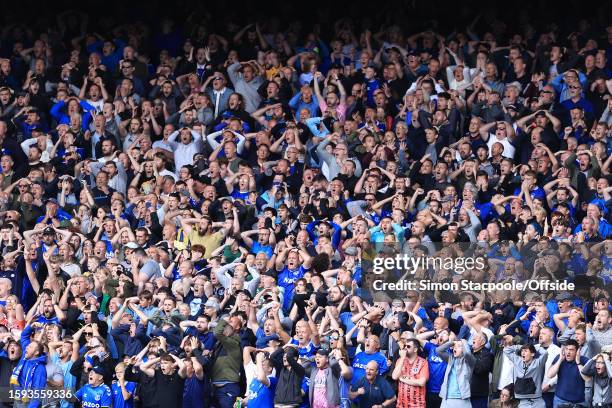 Everton fans look dejected during the Premier League match between Everton FC and Fulham FC at Goodison Park on August 12, 2023 in Liverpool, United...