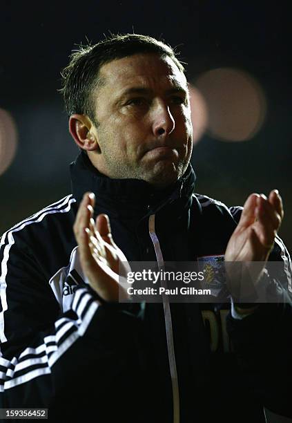 Manager Derek McInnes of Bristol City applauds the fans as he leaves the pitch at the end of the 4-0 defeat to Leicester City during the npower...