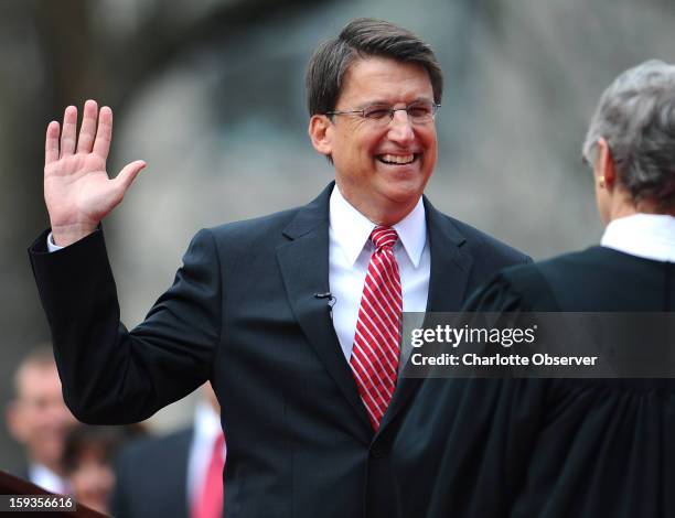 Chief Justice Sarah Parker administers, right, the oath of office to North Carolina Gov. Pat McCrory at the North Carolina State Capitol in Raleigh,...