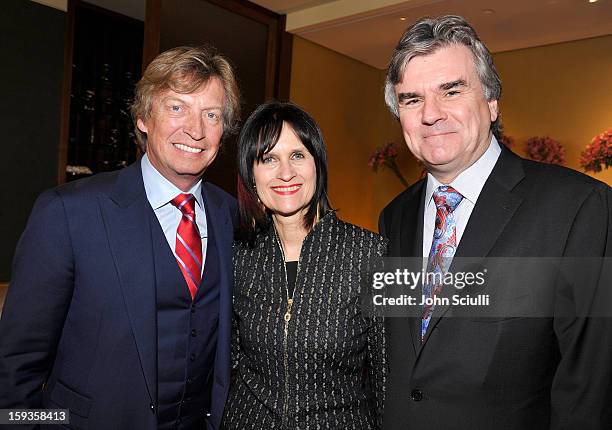 Nigel Lythgoe, Sharon Harroun Peirce and Bob Peirce attend a Golden Globe lunch hosted by BritWeek chairman Bob Peirce honoring Julian Fellowes,...