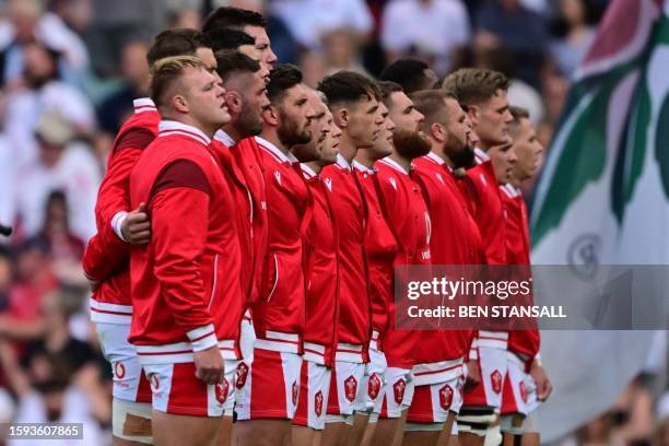 Wales team line up for their National Anthem ahead of the Summer Series international rugby union match between England and Wales at Twickenham...