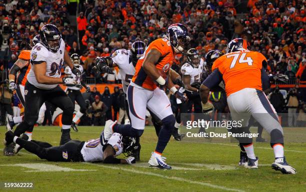 Demaryius Thomas of the Denver Broncos runs for yards after the catch to score a 17-yard touchdown reception in the fourth quarter against the...