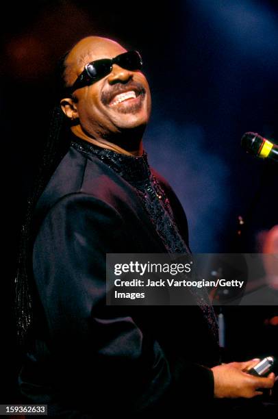 American musician Stevie Wonder smiles at the Rhythm & Blues Foundation's 11th Annual Pioneer Awards, where he received a Lifetime Achievement Award,...