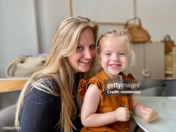 proud aunt with her niece - dutch family stockfoto's en -beelden