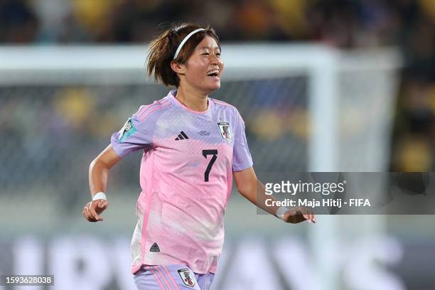 Hinata Miyazawa of Japan celebrates after her team's first goal scored an own goal by Ingrid Syrstad Engen of Norway during the FIFA Women's World...