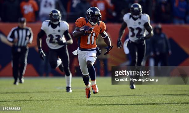 Denver Broncos wide receiver Trindon Holliday runs in an 89 yard punt return for a touchdown early in the first quarter. The Denver Broncos vs...