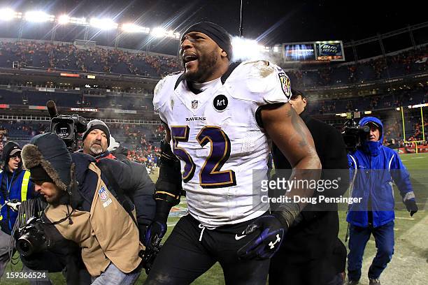 Ray Lewis of the Baltimore Ravens celebrates as he walks off of the field after the Ravens won 38-35 in the second overtime against the Denver...