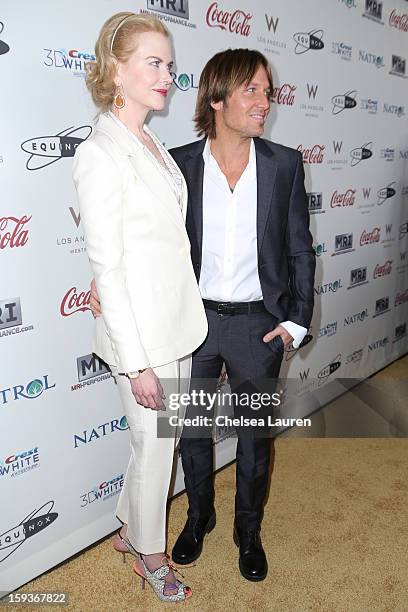 Actress Nicole Kidman and musician Keith Urban arrive at CW3PR Presents the inaugural "Gold Meets Golden" event at New Flagship Equinox Sports Club...