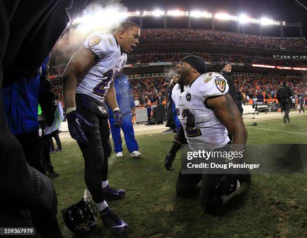 Ray Rice of and Ray Lewis of the Baltimore Ravens celebrate after the Ravens won 38-35 in the second overtime against the Denver Broncos during the...