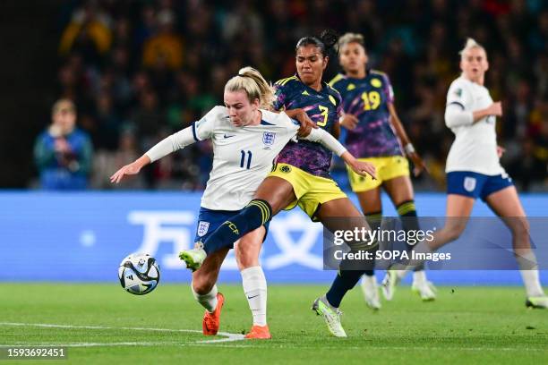 Lauren May Hemp of England women national soccer team and Daniela Alexandra Arias Rojas of Colombia women national soccer team are seen in action...