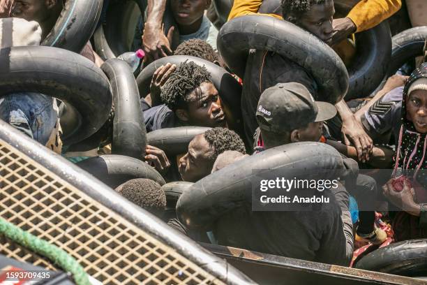 Irregular migrants are seen on the boat as an operation is carried out by the Tunisian National Guard against the migrants who want to reach Europe...