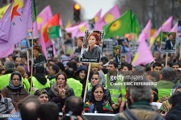 Hundreds of people of Kurdish origin take part in a demonstration on January 12, 2013 in Paris, two days after three Kurdish women were found shot...