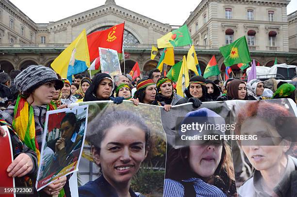 Hundreds of people of Kurdish origin take part in a demonstration on January 12, 2013 in Paris, two days after three Kurdish women were found shot...