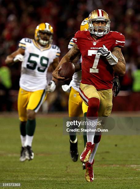 Quarterback Colin Kaepernick of the San Francisco 49ers runs the ball for a touchdown against the Green Bay Packers in the third quarter during the...