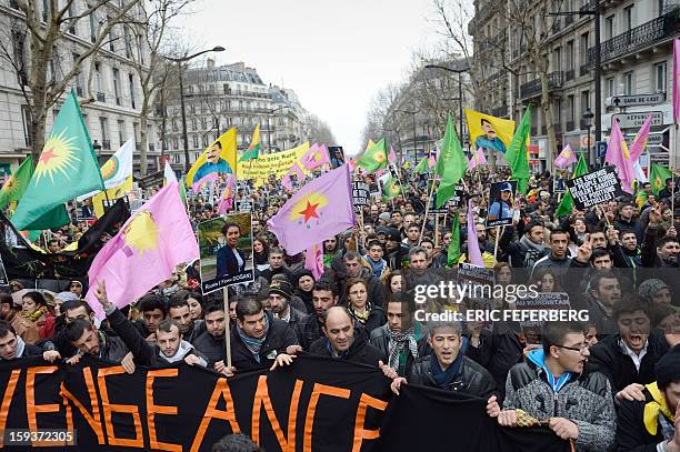 Hundreds of people of Kurdish origin take part in a demonstration on January 12, 2013 in Paris, two days after three Kurdish women were found shot...