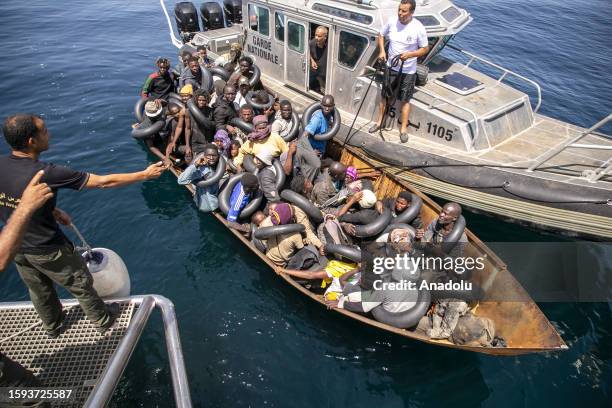 Irregular migrants are seen as an operation is carried out by coastguards teams of the Tunisian National Guard against the migrants who want to reach...