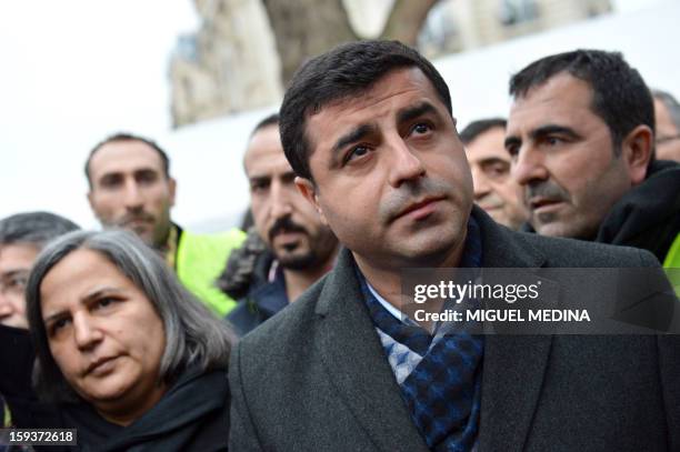 Peace and Democracy Party chairman Selahattin Demirtas and co-chairman Gultan Kisanak take part in a demonstration gathering hundreds of people of...