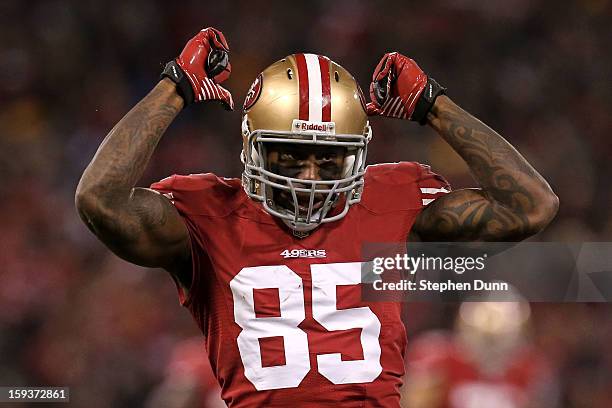 Tight end Vernon Davis of the San Francisco 49ers celebrates after a catch in the third quarter against the Green Bay Packers during the NFC...