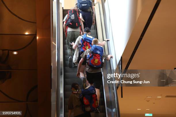 Boy and Girl Scout members from the United Kingdom arrive at the Seoul Dragon City Hotel on August 05, 2023 in Seoul, South Korea. Thousands of UK...