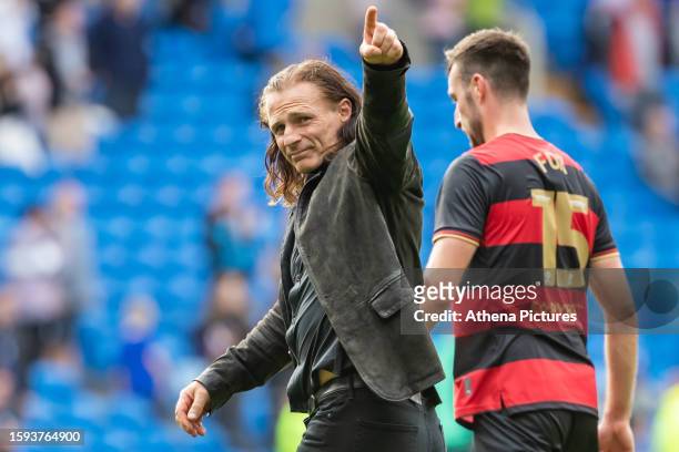 Gareth Ainsworth Manager of Queens Park Rangers celebrates at full time during the Sky Bet Championship match between Cardiff City and Queens Park...