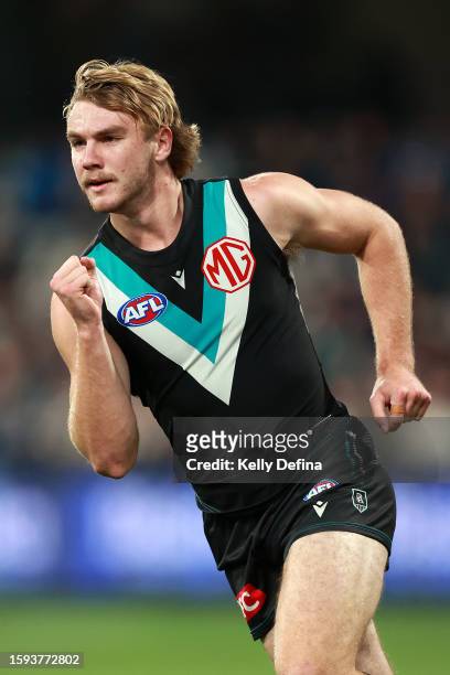 Jason Horne-Francis of the Power celebrates kicking a goal during the round 21 AFL match between Geelong Cats and Port Adelaide Power at GMHBA...