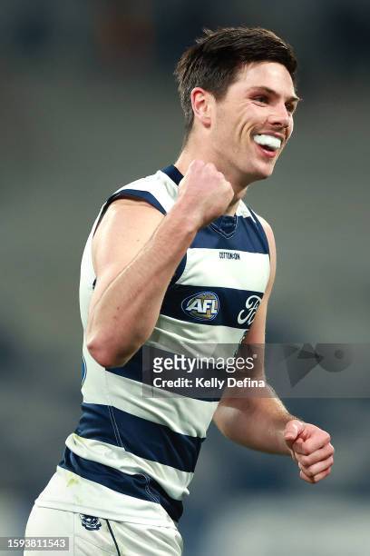 Oliver Henry of the Cats celebrates kicking a goal during the round 21 AFL match between Geelong Cats and Port Adelaide Power at GMHBA Stadium, on...