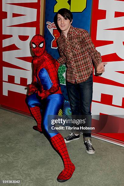 Actor Drake Bell and Spiderman attend "Reading With: Marvel Comics Close-Up" kick-off event at the Burbank Public Library on January 12, 2013 in...