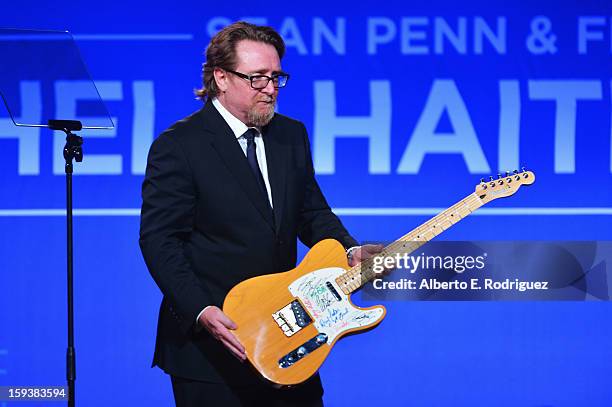 Executive Director Ron Baldwin speaks onstage at the 2nd Annual Sean Penn and Friends Help Haiti Home Gala benefiting J/P HRO presented by Giorgio...