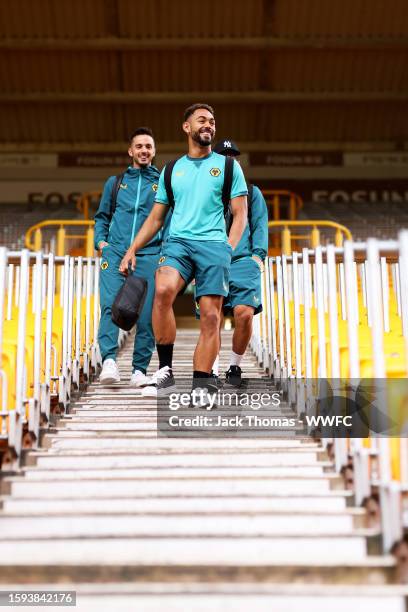 Matheus Cunha, Pablo Sarabia and Joao Gomes of Wolverhampton Wanderers arrive at the stadium ahead of the pre-season friendly match between...