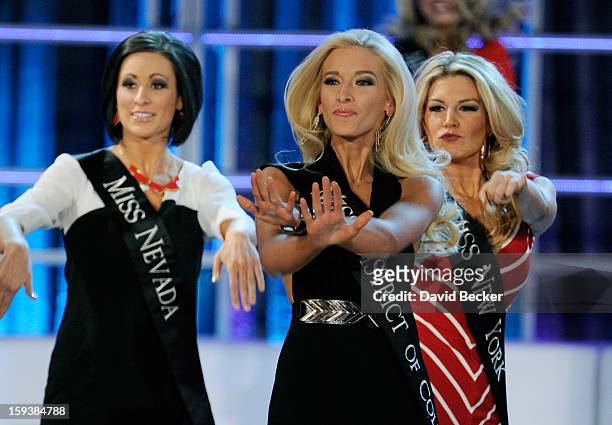 Randi Sundquist, Miss Nevada, Allyn Rose, Miss District of Columbia and Mallory Hytes Hagan, Miss New York, perform during the opening of the 2013...