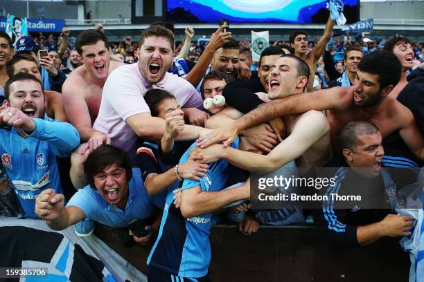 Blake Powell of Sydney celebrates with fans following the round 16 A-League match between Sydney FC and the Melbourne Heart at Allianz Stadium on...