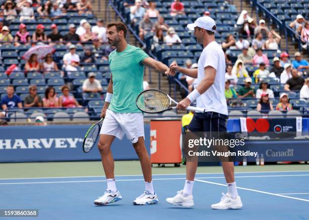 Marcel Granollers of Spain and Horacio Zeballos of Argentina play against Marcelo Arevalo of El Salvador and Jean-Julien Rojer of The Netherlands...
