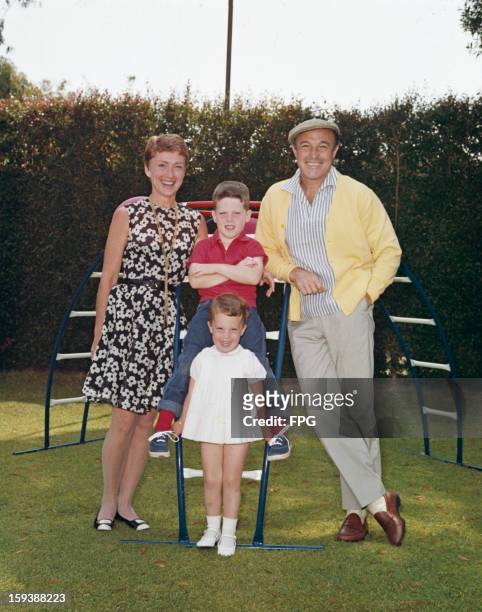 American actor, dancer and singer Gene Kelly with his wife Jeanne Coyne and their children Tim and Bridget, circa 1968.