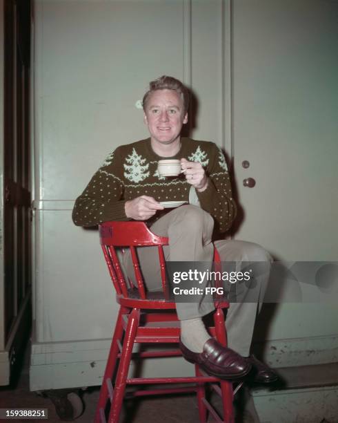 American actor Van Johnson wearing a Christmas sweater, circa 1950.