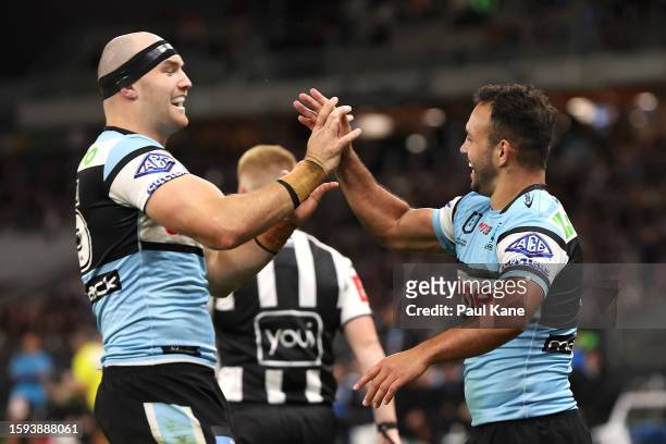 Thomas Hazelton and Braydon Trindall of the Sharks celebrate a try during the round 23 NRL match between South Sydney Rabbitohs and Cronulla Sharks...
