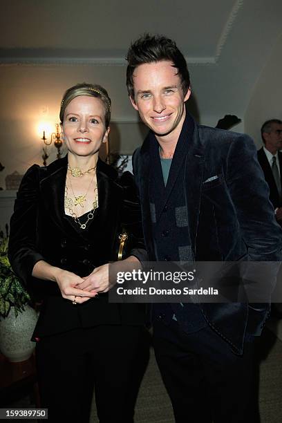 Jacqueline Crocker and actor Eddie Redmayne attends a cocktail party celebrating 2013 Golden Globe nominee Julianne Moore hosted by LoveGold at...