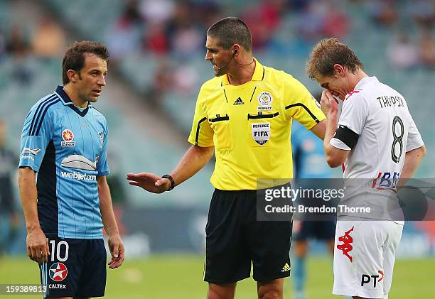 Referee, Peter O'Leary seperates Alessandro Del Piero of Sydney and Matt Thompson of the Heart after an altercation during the round 16 A-League...