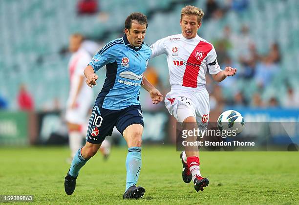 Alessandro Del Piero of Sydney competes with Stefan Mauk of the Heart during the round 16 A-League match between Sydney FC and the Melbourne Heart at...