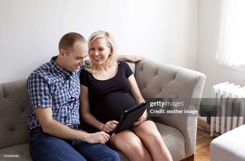 Expectant parents relaxing together
