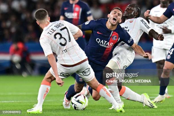 Lorient's French midfielder Jean-Victor Makengo fouls Paris Saint-Germain's French defender Lucas Hernandez during the French L1 football match...